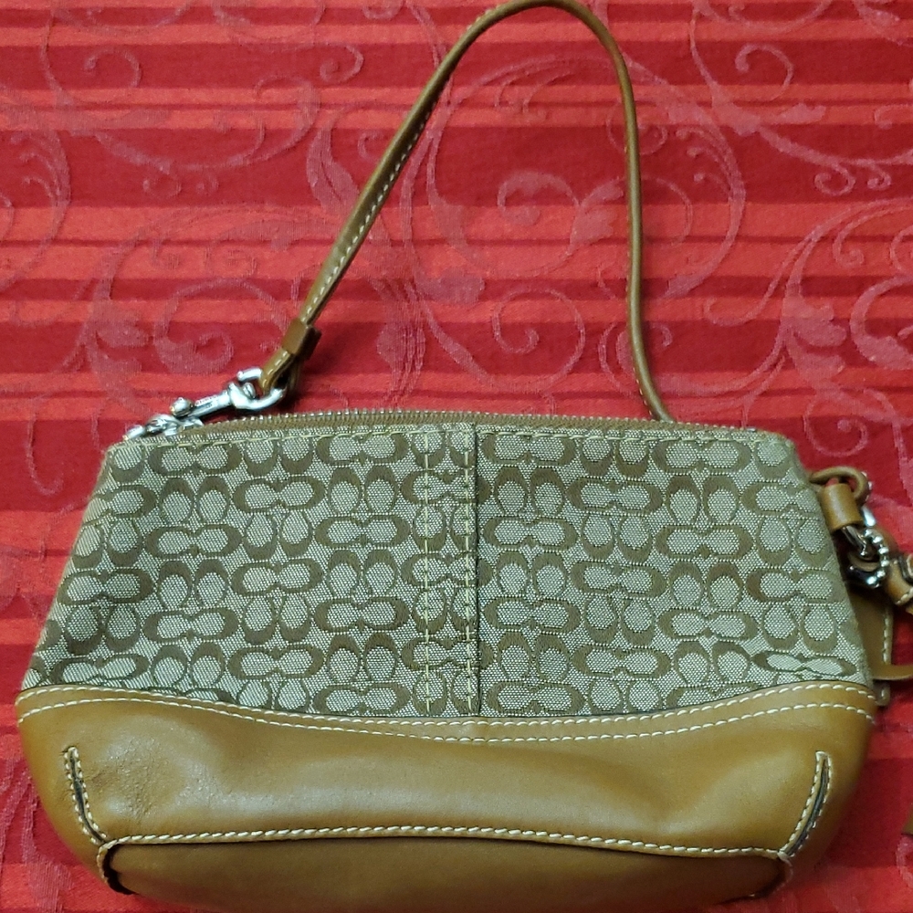Stylish Tan and Brown Coach Wristlet